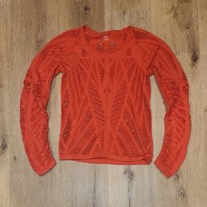 ALO Yoga Long Sleeve Cutout Sweater in Orange